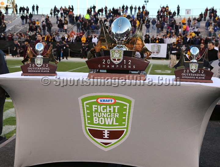122912 Kraft SA-060.JPG - Dec 29, 2012; San Francisco, CA, USA; Trophies in the 2012 Kraft Fighting Hunger Bowl at AT&T Park.